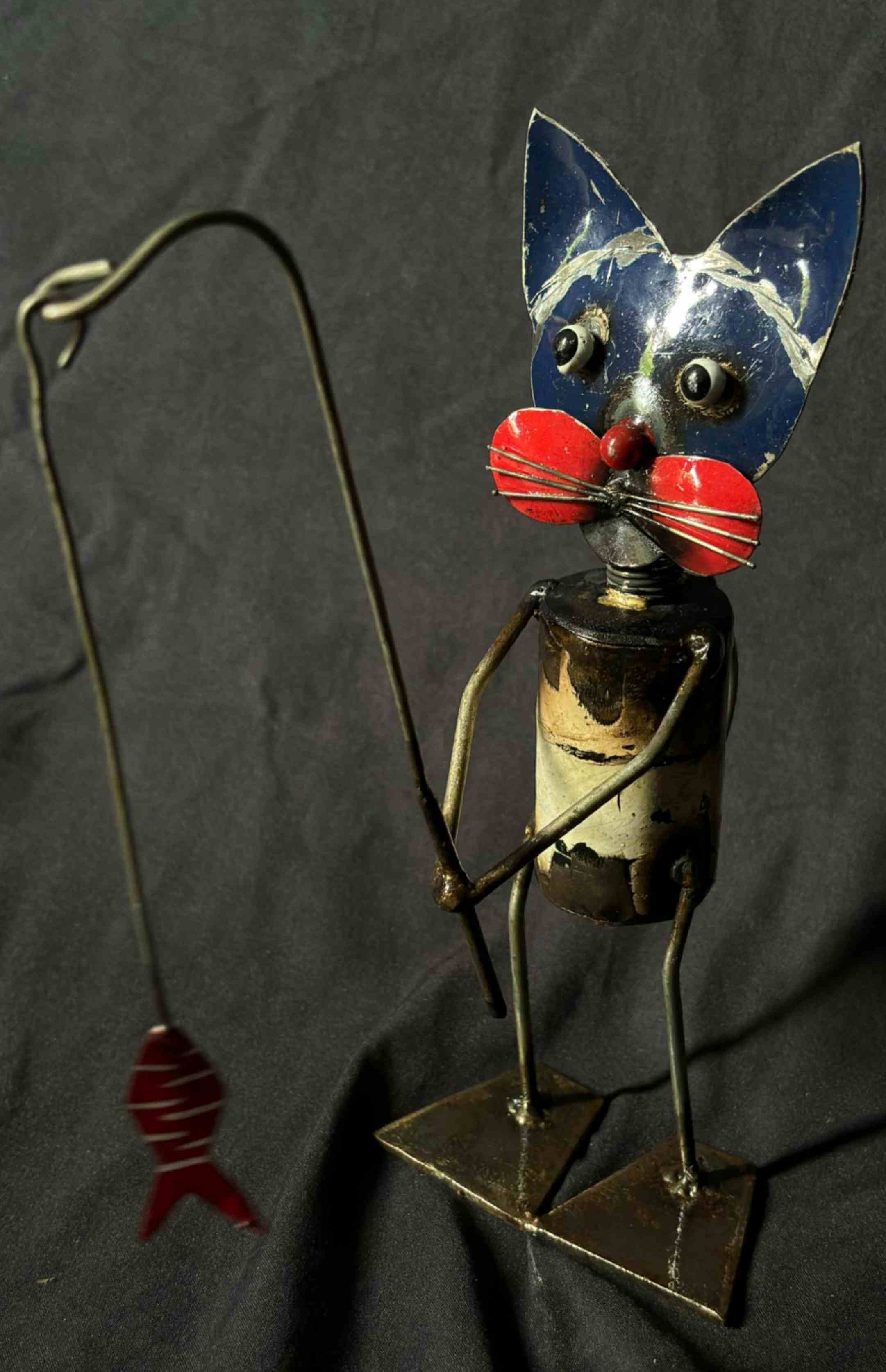 Cat souvenir made from drums